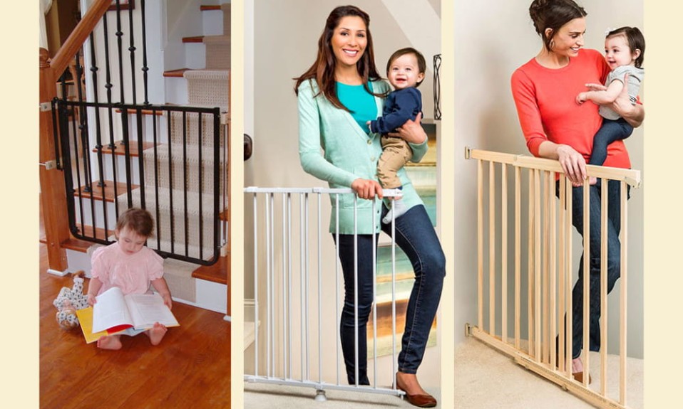 The image shows a baby gate installed at the top of a staircase. The gate is white with vertical bars and has a latch on the side.